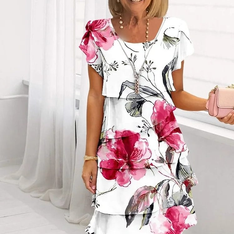 Melanie – Stilfull Blommig Klänning