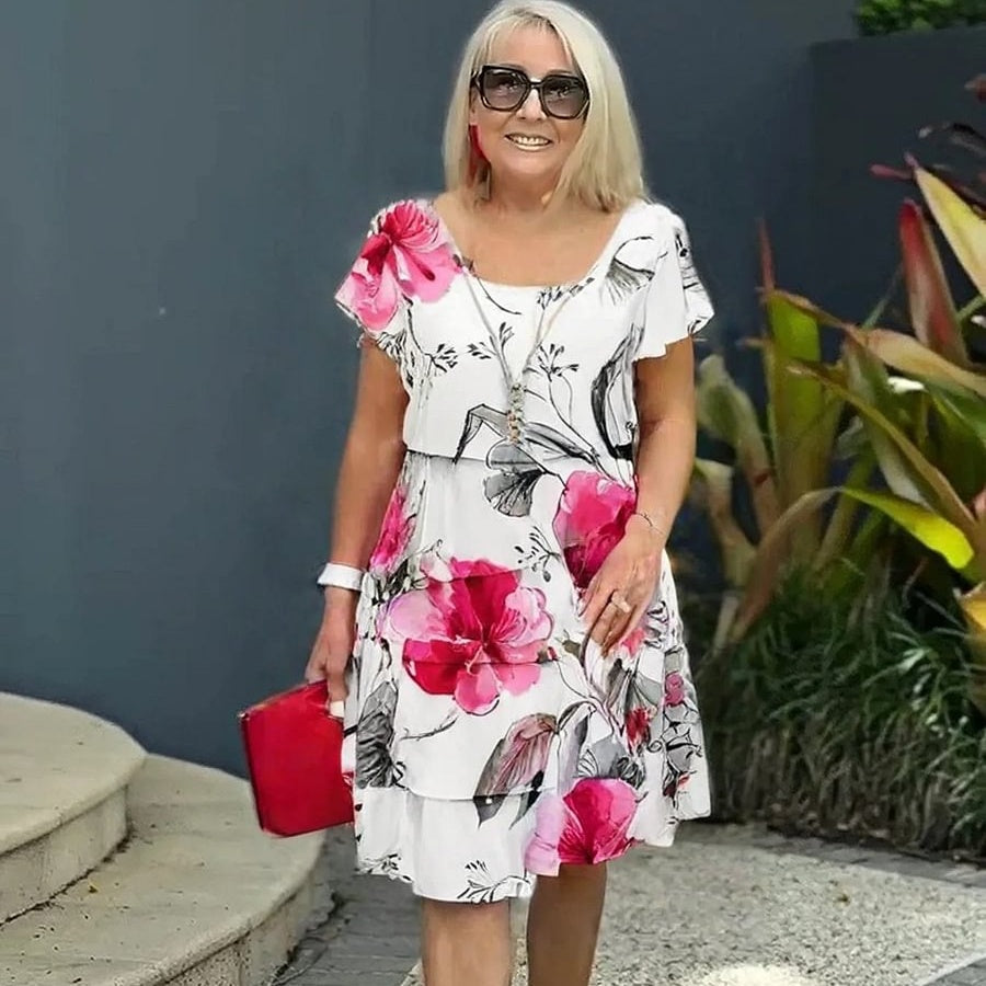 Melanie – Stilfull Blommig Klänning